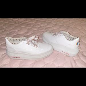 I have these super cute Hello Kitty sneakers they are a size 9.5 in US size.